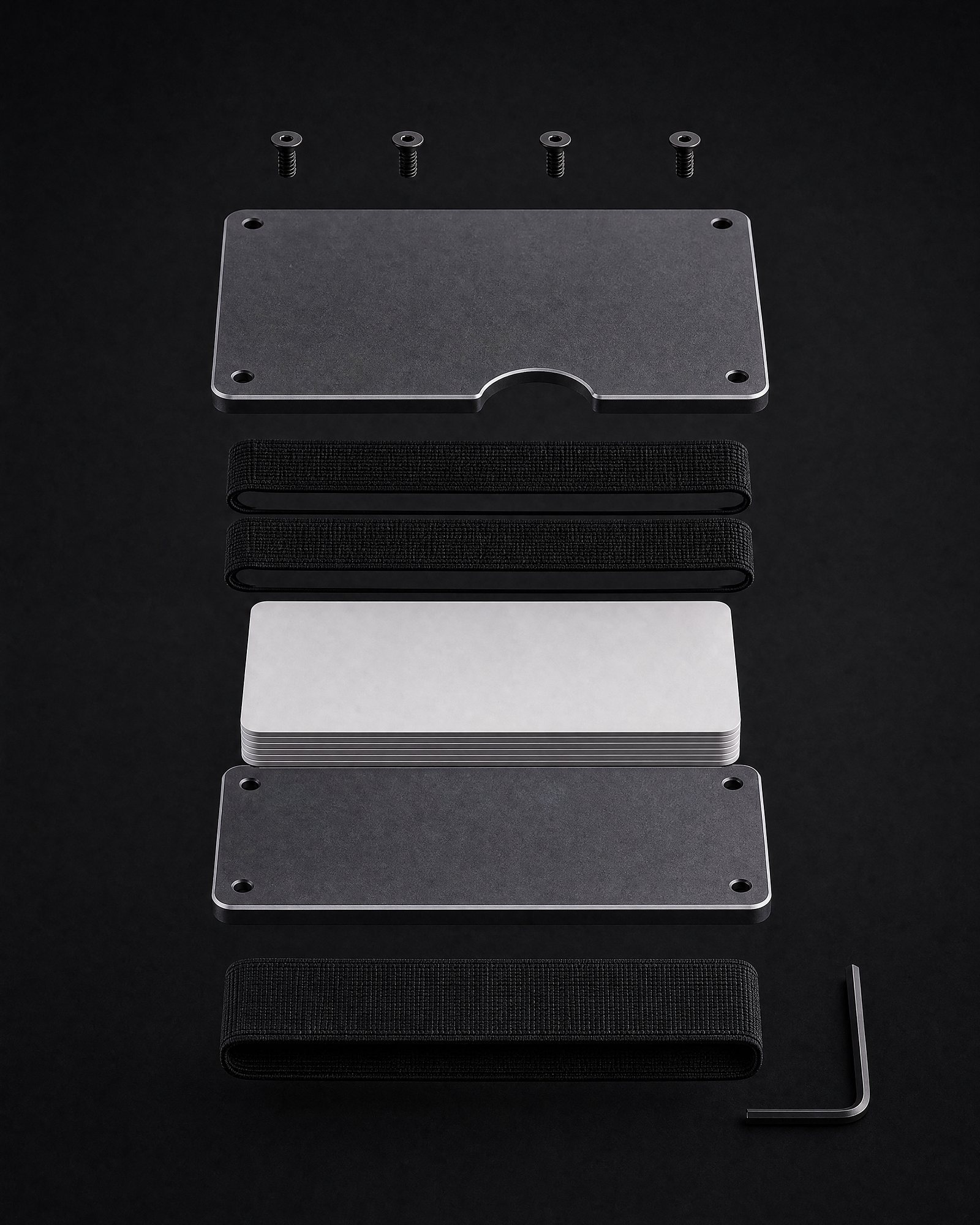 The parts of an ANODE wallet laid out: two metal plates, the elastic frame, the screws and the cash strap