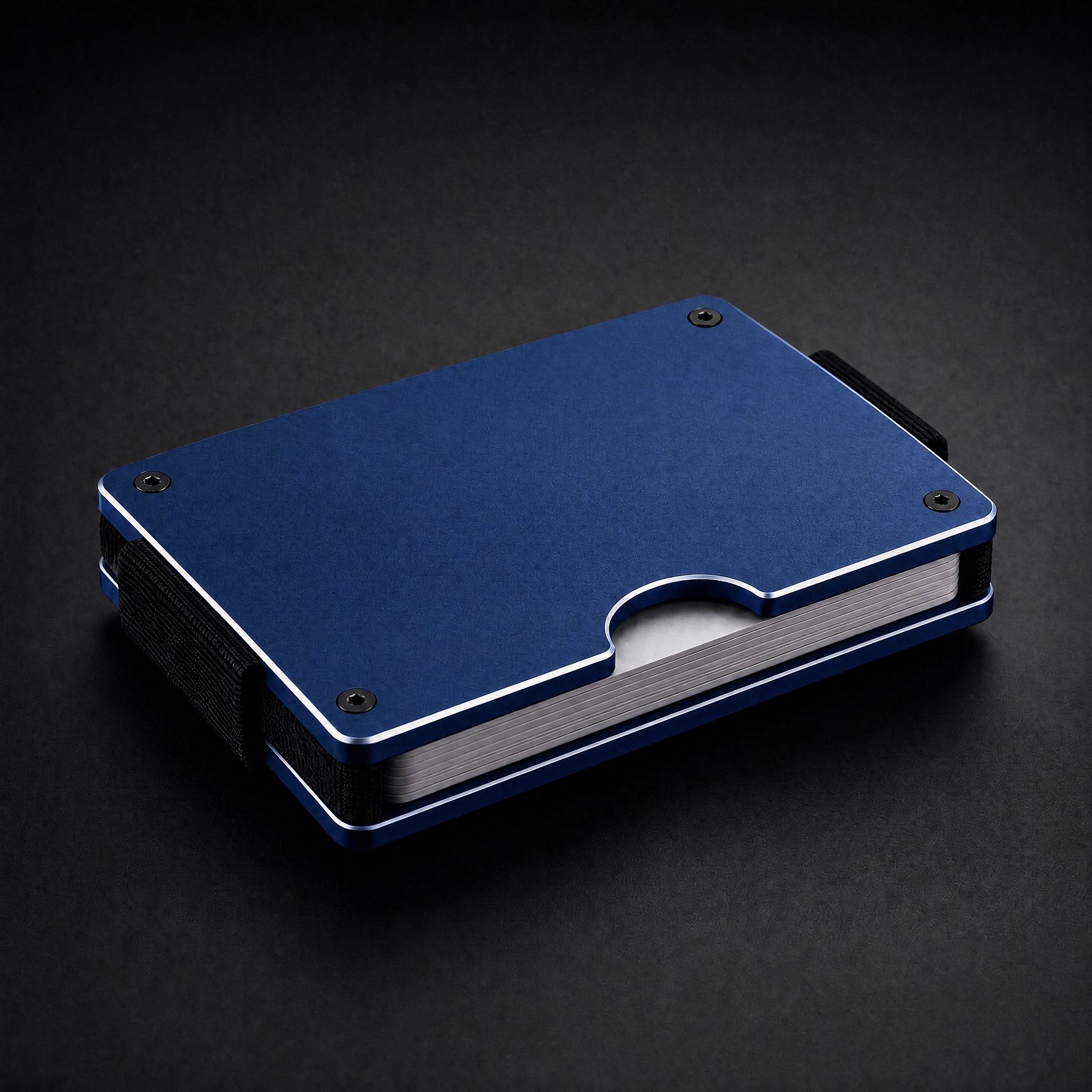 ANODE Aluminum Wallet in cobalt blue, three quarter view with cards between the plates