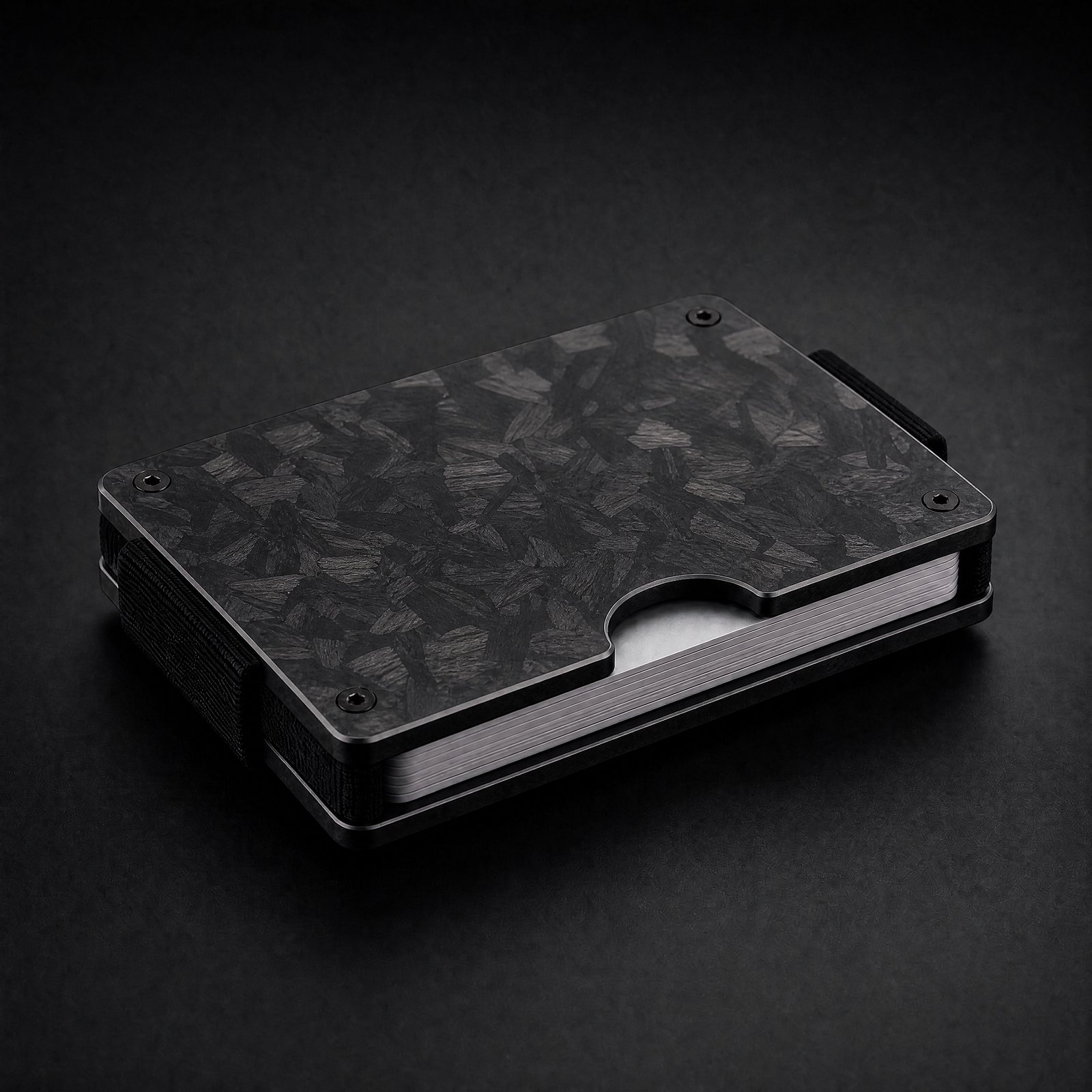 ANODE Forged Carbon Wallet with a marbled black and gray pattern, three quarter view