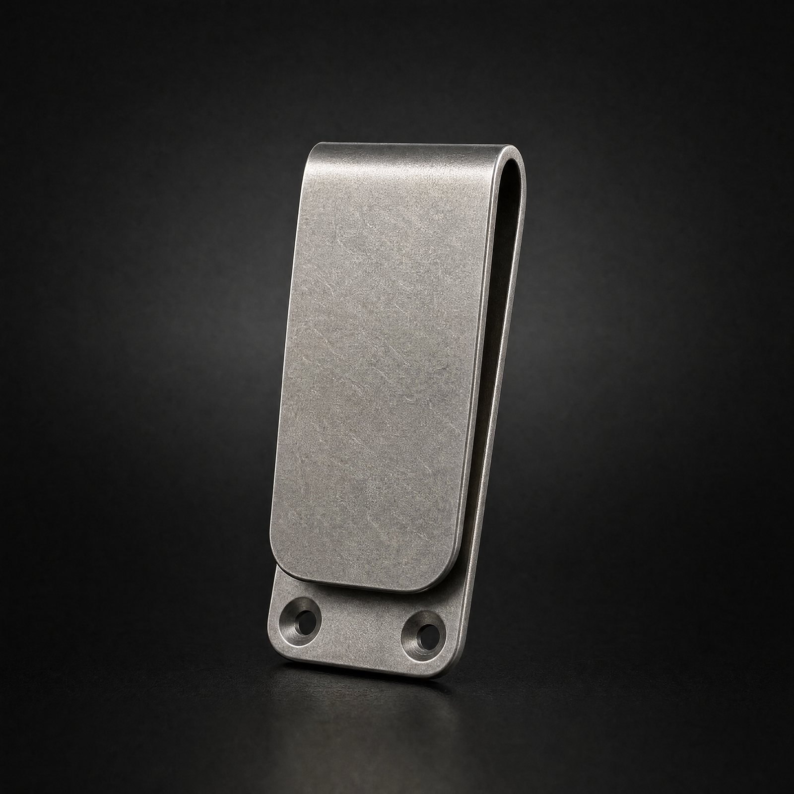 ANODE Money Clip in stonewashed titanium, three quarter view