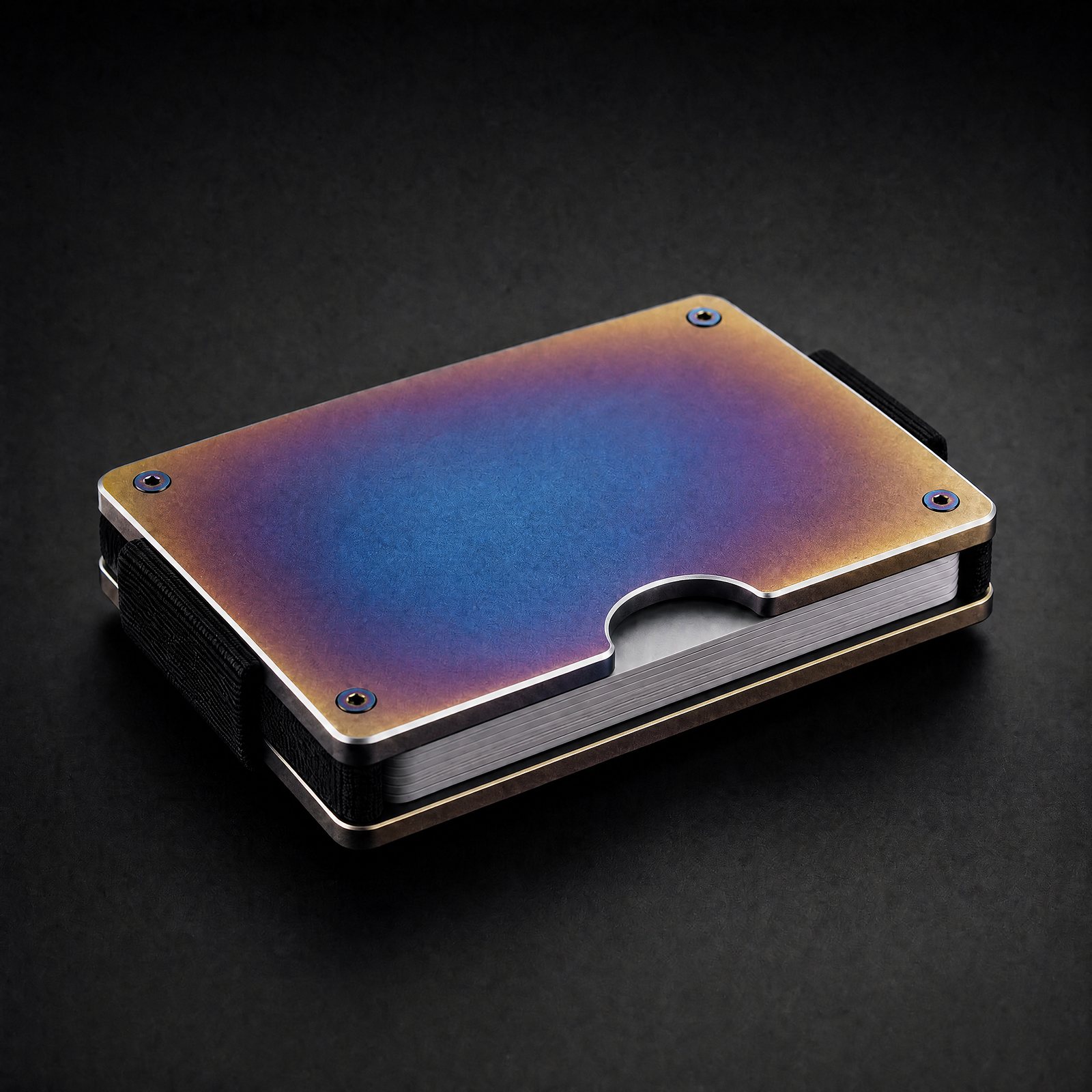 ANODE Titanium Wallet in burnt titanium, a blue, violet and bronze heat colored finish, three quarter view