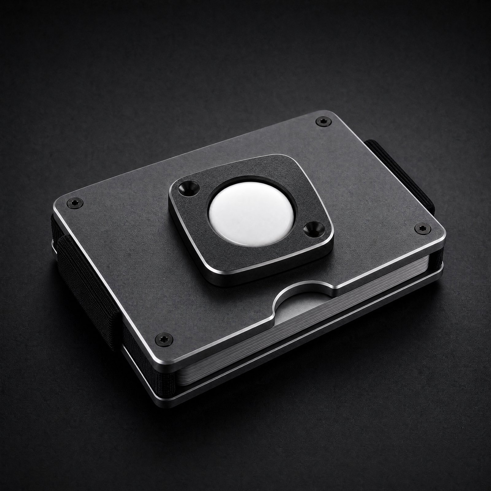 The ANODE Tracker Mount screwed onto the back plate of an ANODE wallet